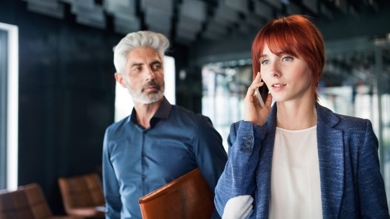business-people-in-the-office-making-a-phone-call-PQZTHDY-1600x900