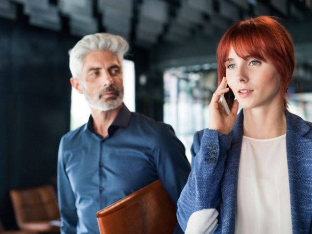 business-people-in-the-office-making-a-phone-call-PQZTHDY-1600x900